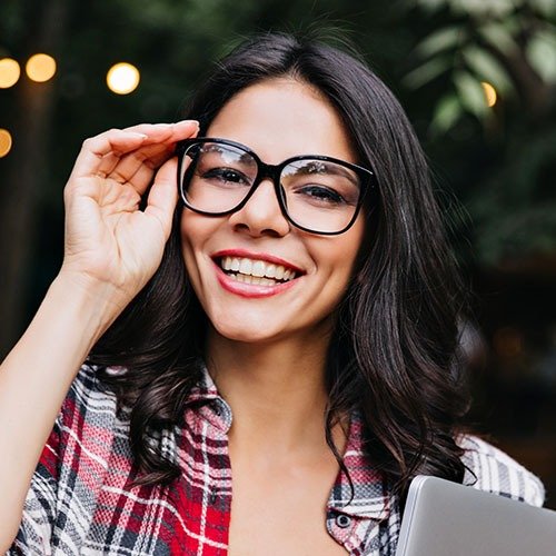 amazing female student in glasses standing on the 9NX6FUW